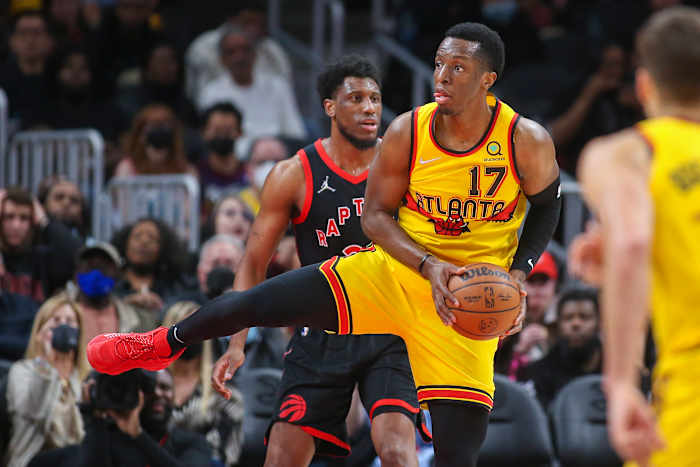 Onyeka Okongwu grabs a rebound.